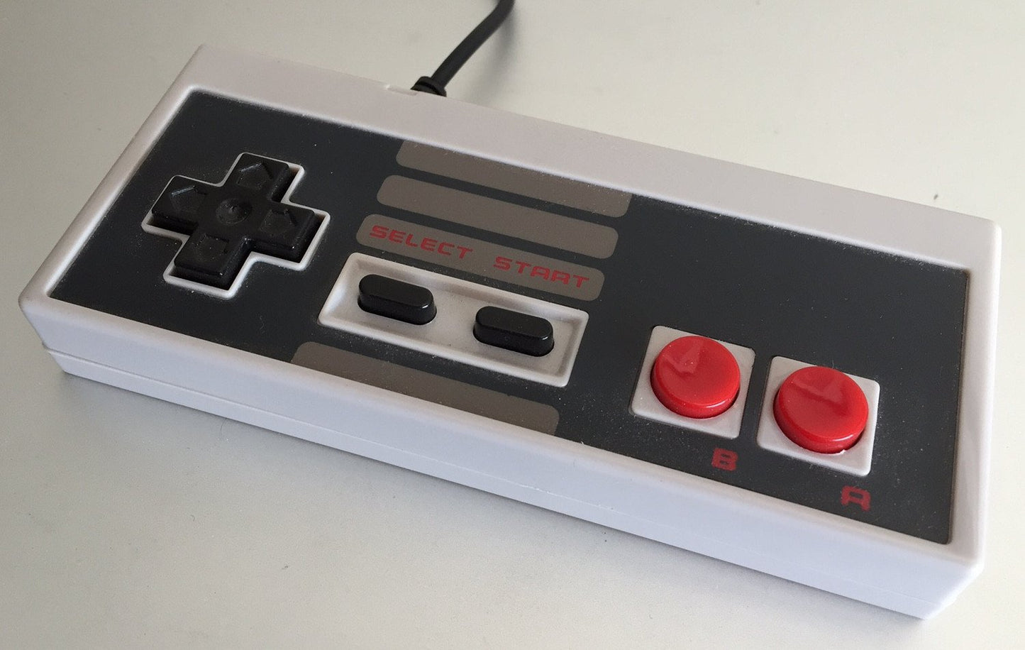 J2Games.com | NES Controller (Tomee) (Brand New).